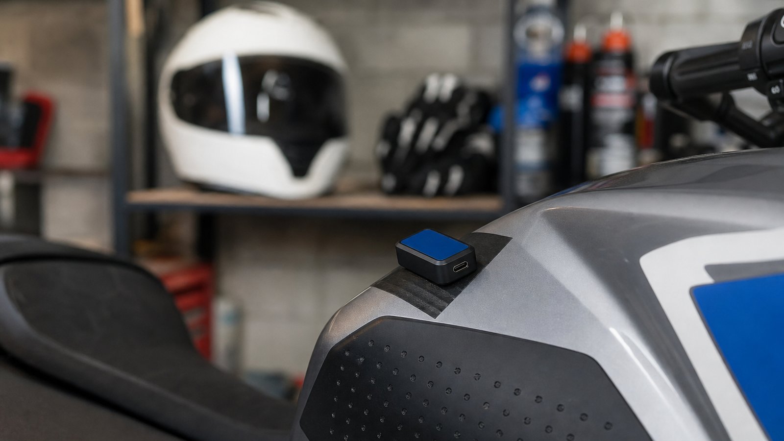 Mini Bluetooth IMU taped on motorcycle tank in UK garage